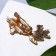 Brooch "Fox" with a shining tail, colored in gold