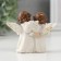 Polystone souvenir "Two angels in with a flute and book" 6.2x7.5x3.2 cm