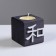 Candle in a wooden candlestick "Cube, hieroglyphs. Harmony", Eben, Mango aroma