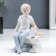 Souvenir Ceramics "Boy on a bench with a dog" 14 cm