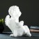 Climb "Angel sitting in his hand", 26x21x30cm, white