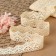 Knitted lace, 32 mm × 10 ± 1 m, beige color