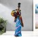 Polystone souvenir "African in a colored dress, with a fruit basket" mix 32.5x10x8 cm