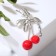 Brooch "Cherry" with leaves, mobile, red color in matte silver