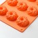 The form for baking the share "German cupcake. Openwork ", silicone, 12 cells, 28 × 16 × 1.5 cm, orange color