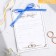 Wedding invitation, white, purple tape, with embossing