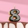 Candle in the Sanata cake, number "8", black with gold stars, 5.5 cm