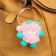 Fluffy on cable with a tambourine "Freak with green ears" Direct pink 8 cm