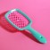 The comb is massage, wide, ventilated, 8.5 × 20.5 cm, PVC box, turquoise/pink color