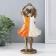 Polystone souvenir "Two sisters" bronze, orange-white 10.5x6.5x21.5 cm