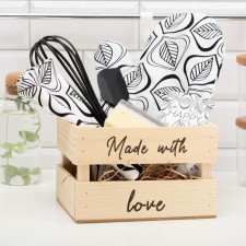 Gift Made with Love: a towel, a mittens-output, a kitchen blade, a corolla, a sponge