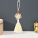 Suspension textiles, plastic "Knot of happiness and infinity" White-yellow 8.5 cm