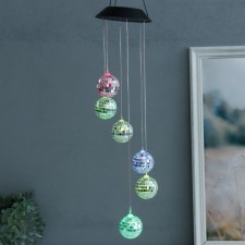 Wind music with illumination from the solar battery 