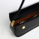 Female bag, baguette, on a magnet, black color