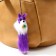 Fluffing on a pendant with colored bells mix