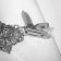 Cardigan clamp "Flowering", color black silver
