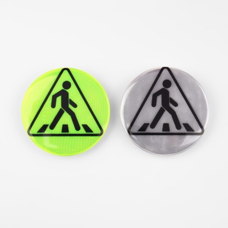 The reflective icon "Pedestrian crossing", D = 5.8 cm, color mix-6