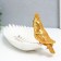 Souvenir Polystone stand "Golden parrot with a crest on a white sheet" 11x24.5x11 cm