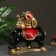 Figure "Hotty on the buffalo" red gold 46x22x38.5cm