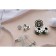 A button on the leg, d = 10 mm, the color is white/silver