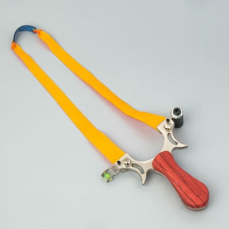 A slingshot with a wooden pen, with a laser target designator-2