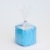 Candle "Square. Marble" in a candlestick of gypsum is small, 5x4.5 cm, blue