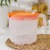 Container for a mixer, 1.5 l, color orange color
