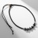 The pendant on the unisex cord is hematite, the length is regulated, 35 cm