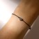 Bracelet of desires "hematite silver" heart on a black thread, the length is regulated