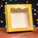 Self -charged box, with a window, gold, 16 x 16 x 3 cm