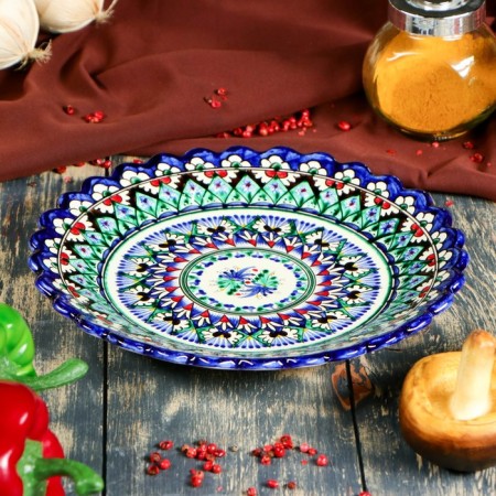 Plate of the Rishtan ceramics "Flowers", blue, embossed, 23 cm