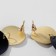 Earrings Metal "Trend" convex discs, black color in matte gold