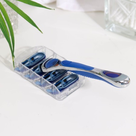The machine is a razor and 12 interchangeable cassettes of blades, compatible with Gillette Fusion-3