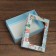The box is folding, the lid is, with the “New Year's gift” window 24 x 17 x 8 cm