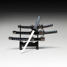 Suv. The product of the katan-mini 3v1 on the stand, the sheath is black with white rhombuses 16/20/24.5cm