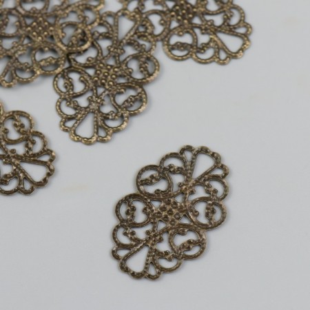 Decorative eelement of bronze 2x3.2 cm-1