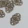 Decorative eelement of bronze 2x3.2 cm