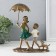 Polystone souvenir "Children walk under an umbrella, with a puppy" Bronze 18x9.5x21.5 cm
