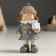 Souvenir Polystone "Baby in a coat with a gift" costs 5x4.5x11 cm