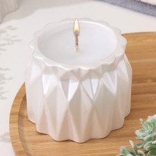 A candle in a candlelight made of gypsum with sharp faces of 10.5x8.5cm, white mother of pearl