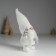 Polystone souvenir "Santa Claus in a white knitted cap, with a silver Christmas tree" 8.5x5x18 cm