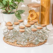 A set of glass jars for bulk products with a cork cover of the Parfa. Star 