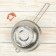 A colander "Marco", d = 19 cm, 37.5 x19.5 x 7 cm, a long handle, stainless steel, chrome