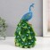 Polystone souvenir "Blue peacock with a green tail" 12.5x14x25 cm
