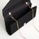 Female bag on a magnet, black color