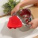 A colander is a kitchen wrap on a trunk of a share, 12 × 18.5 cm, color mix