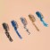 Tergets for the decor "Heavenly flicker", a set of 12 bottles, large/small, multi -colored