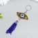 Keychain Metal eyes "Eye and bead brush" 9x5.5 cm