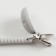 Holder for the nipple - dummy "pigtail", silicone, gray color