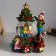 Souvenir Polystone Water Ballion Music, Light "Boy decorates the Christmas tree" D = 10 cm 18x16x23 cm